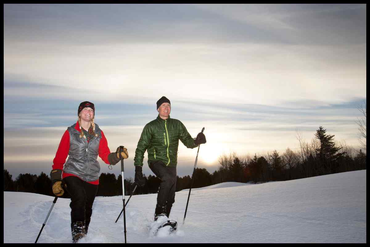 Man and woman snowshoeing